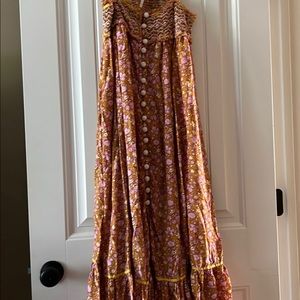 Free People maxi dress. Pockets. Adjustable straps. Cut out back.